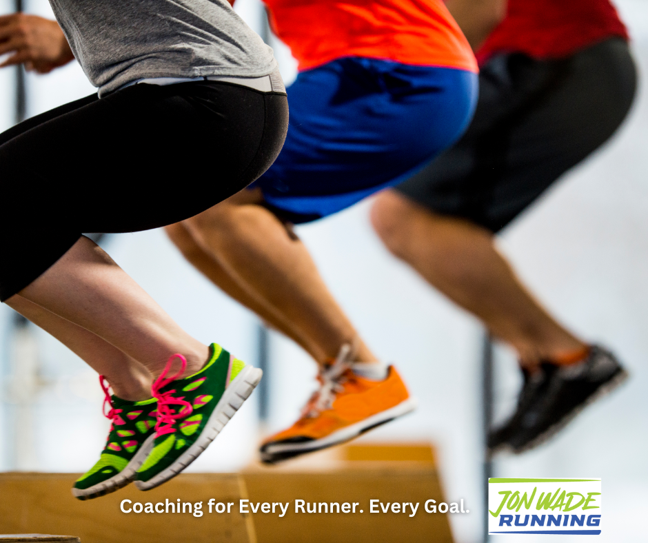 Runners doing box jumps during plyometric training to improve running speed and performance.